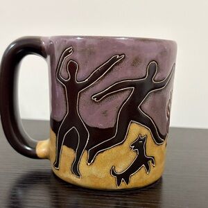 Handcrafted Signed Mara Mug with Purple and Brown Design.